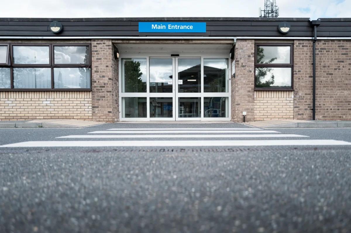 Pedestrian crossing and main entrance at a British hospital